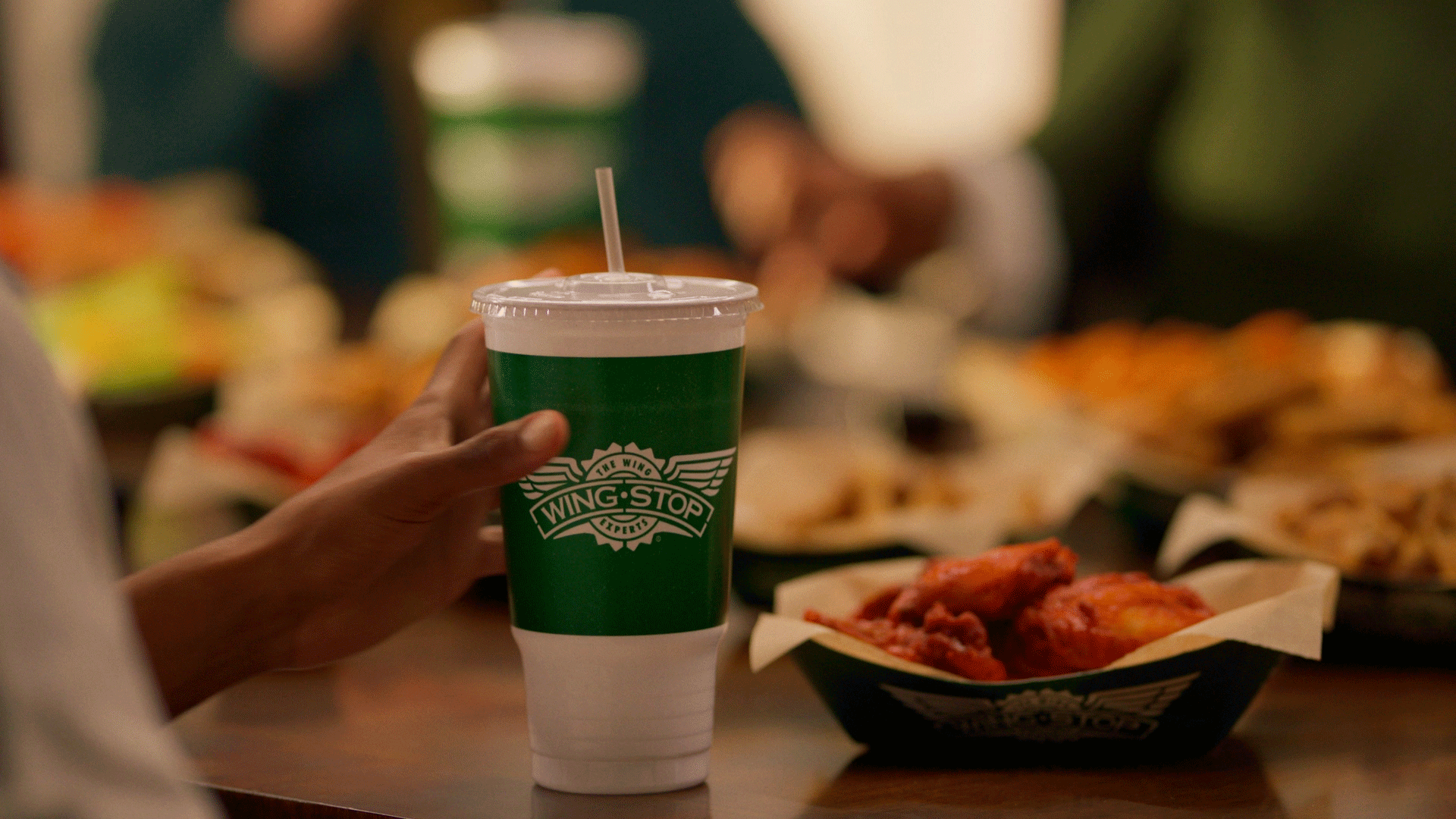 WINGSTOP — HOME OFFICE PARTY